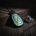 Buddha pendant - Unique Labradorite - Dark wood with dramatic lighting